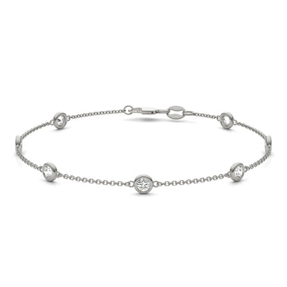 0.70 CTW DEW Round Moissanite 7-Stone Station Bracelet in Sterling Silver