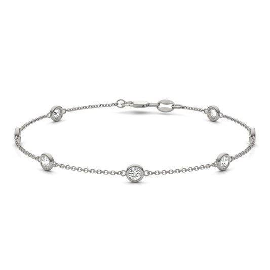 0.70 CTW DEW Round Moissanite 7-Stone Station Bracelet in Sterling Silver